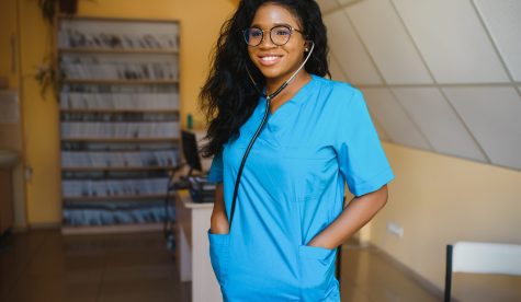 attractive female african american medical professional in office